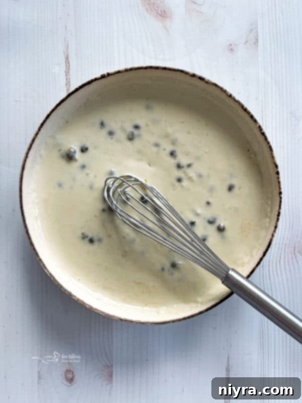 Pan-Seared Salmon and Shrimp in Lemon Caper Sauce 8 Top view of lemon caper sauce