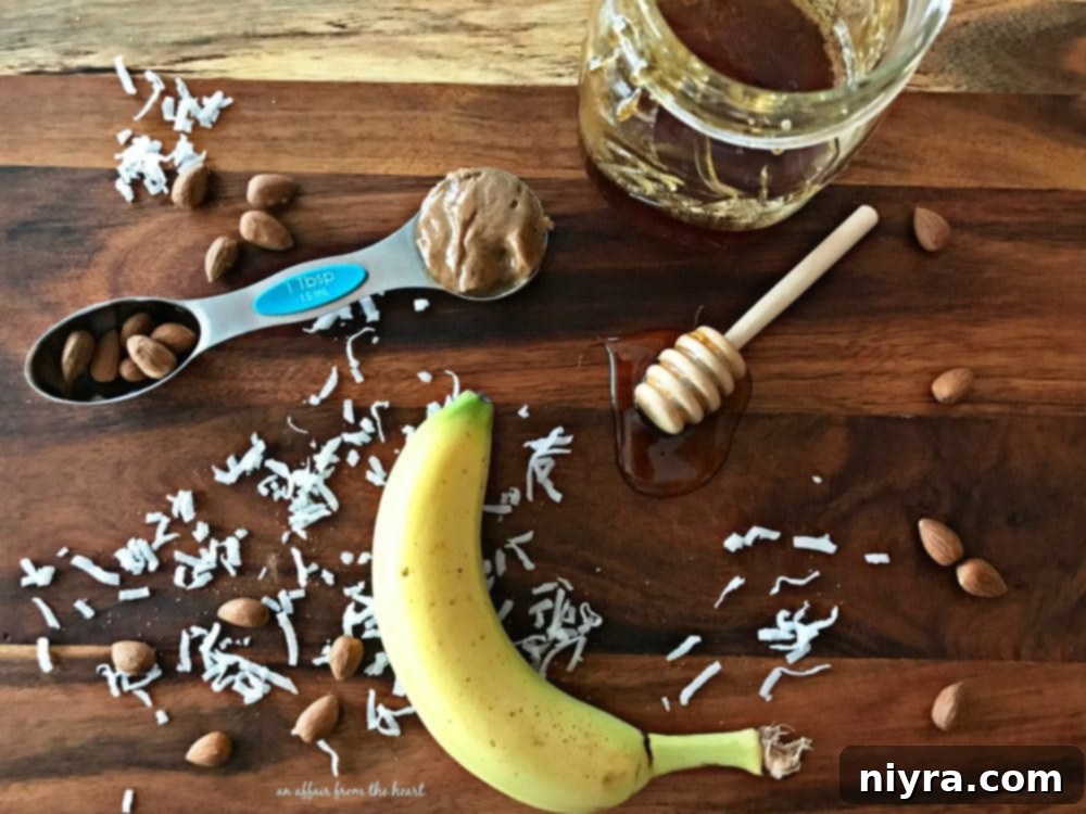 Fresh ingredients for a Nutty Monkey Smoothie, including banana, almond butter, almond milk, honey, coconut, and cinnamon