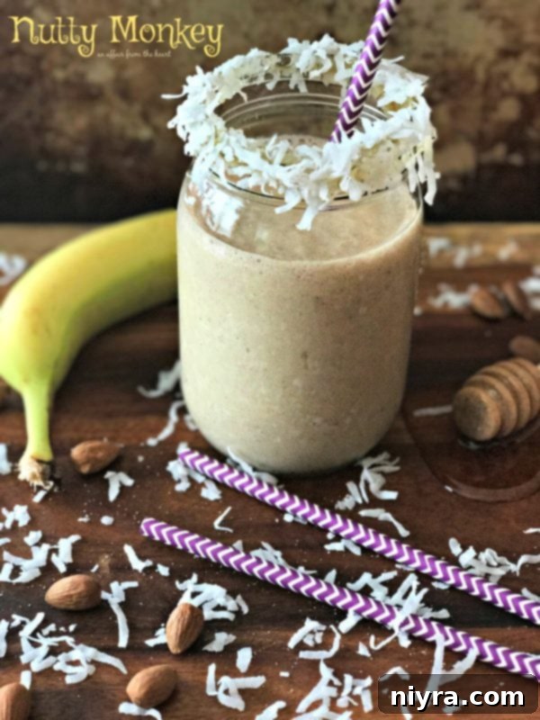 A vibrant Nutty Monkey Smoothie, a healthy and delicious banana almond coconut drink
