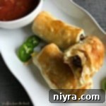 Southwestern Sausage Brunch Roll-Ups on a white plate