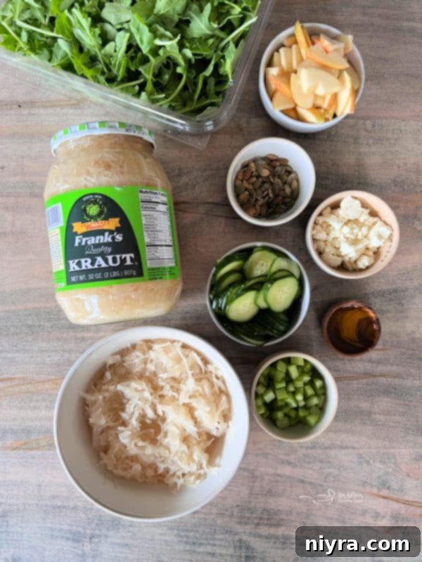 Overhead shot of the Sauerkraut Arugula Salad, beautifully arranged.