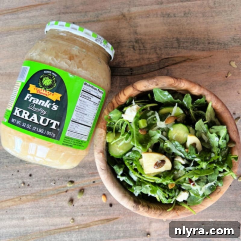 A full bowl of the TikTok Sauerkraut Arugula Salad, highlighting the fresh, crunchy ingredients.