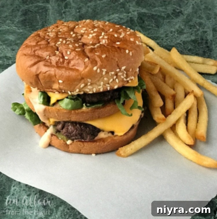 Copycat McDonald's Big Mac burger close-up on parchment paper