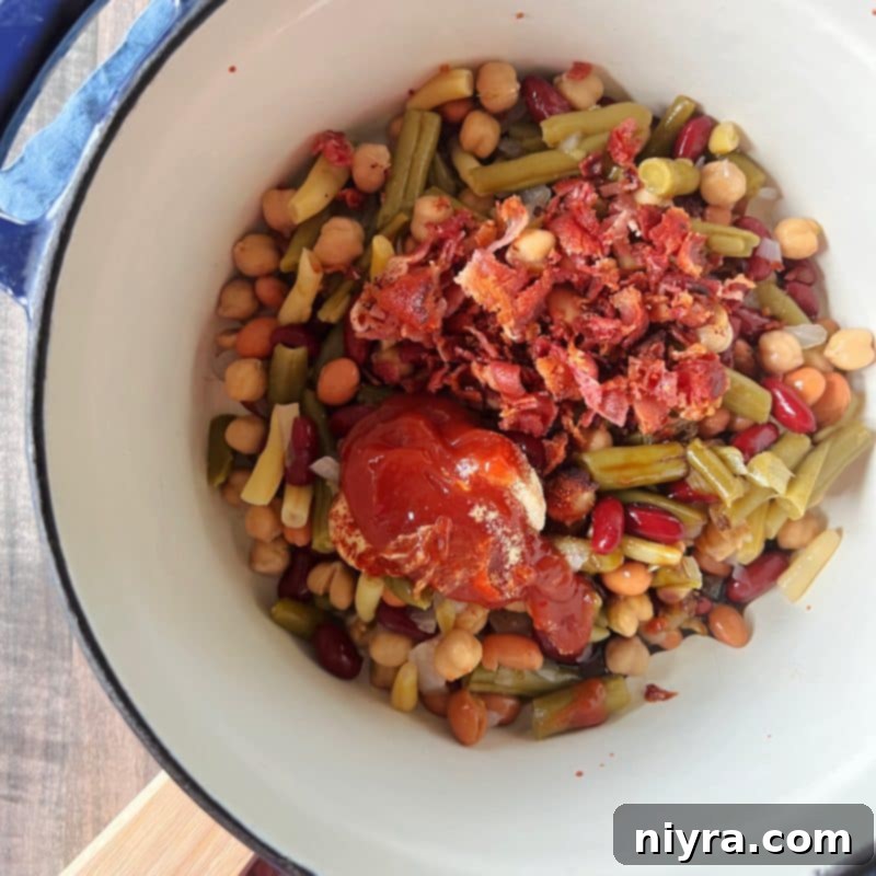 Non-stick spray being applied to a casserole dish, a crucial prep step.