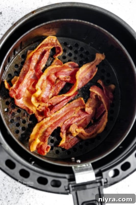Air Fryer Bacon in an air fryer basket
