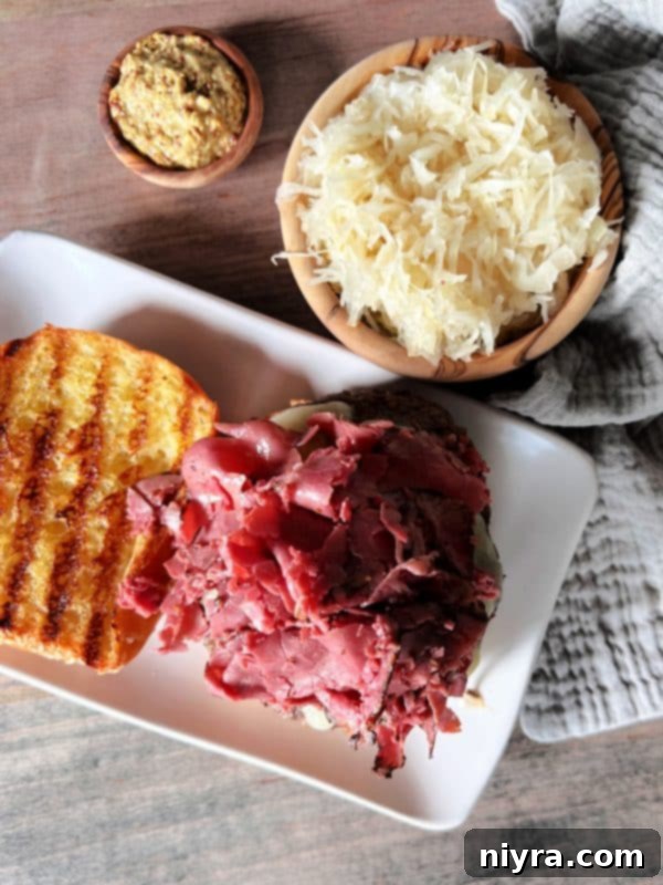 Step-by-step image of placing burger patty on bun