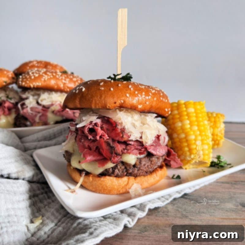 Pastrami Burger with Kraut on a white plate, ready to be served