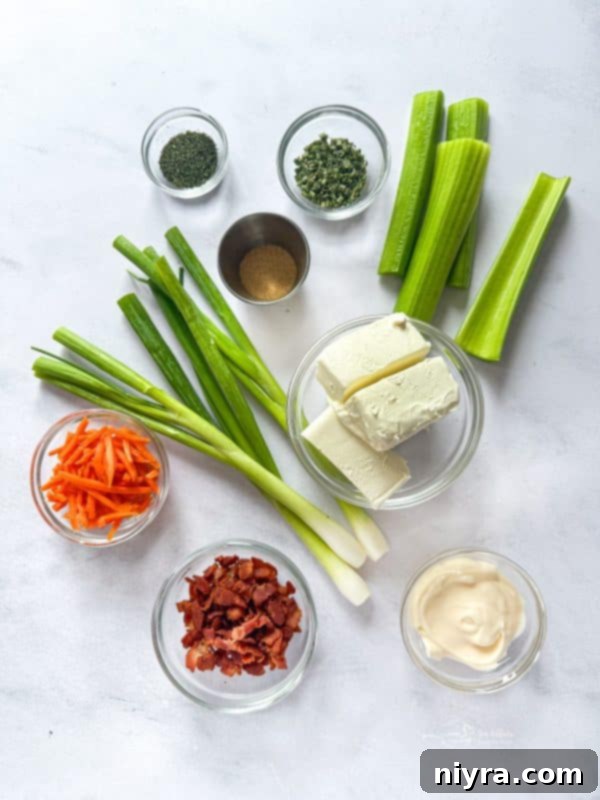 Loaded Bacon Veggie Sandwich Spread 5 Ingredients for Bacon Veggie Sandwich Spread on a cutting board