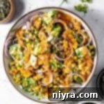 Grilled Corn and Avocado Salad presented beautifully in a large serving bowl