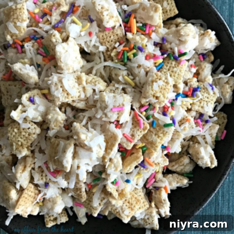 Coconut Muddy Buddies with festive sprinkles
