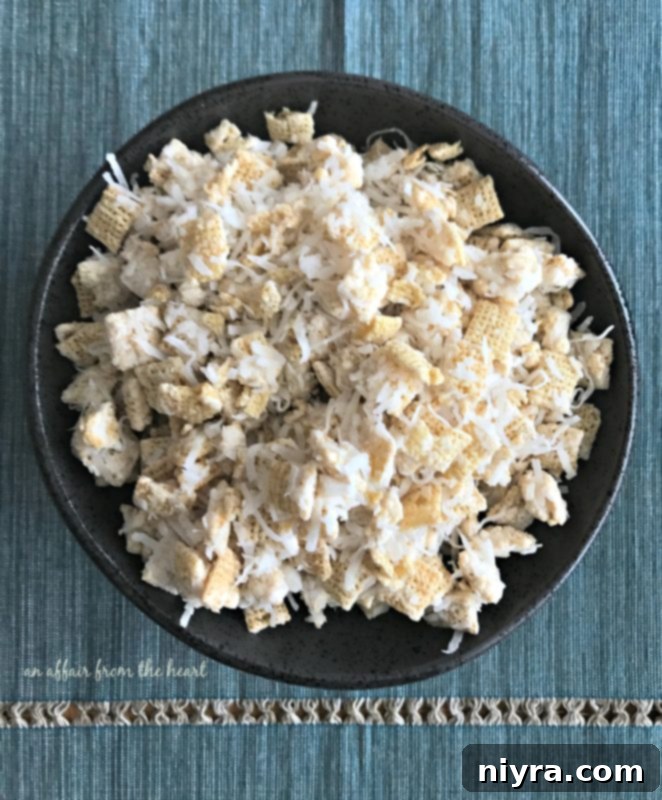 Individual serving of Coconut Muddy Buddies