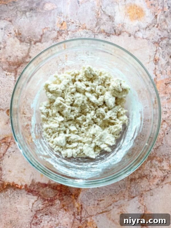 Fluffy Buttermilk Biscuits 8 Cutting shortening into flour with a pastry blender