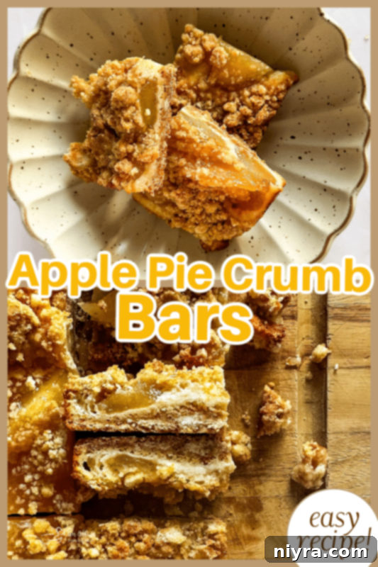 Apple Pie Crumb Bars on a serving dish, one with a fork