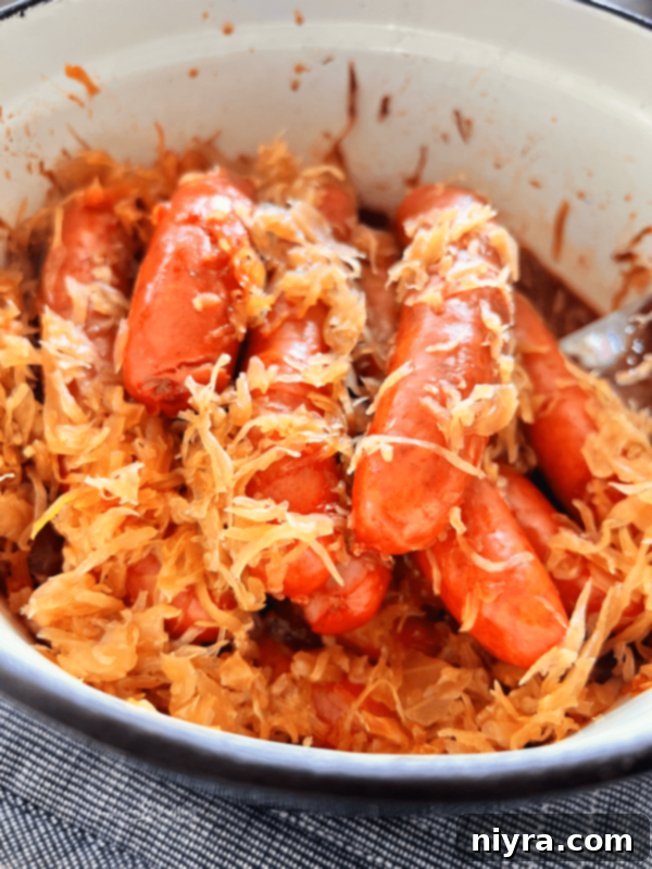 BBQ Hot Dogs with Sauerkraut in a pot