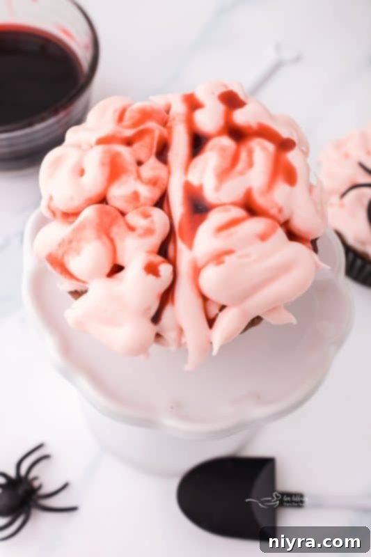 Close-up of a Halloween Brain Cupcake with edible blood