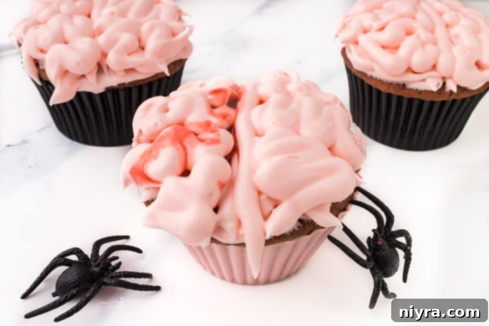 Overhead view of several Halloween Brain Cupcakes with edible blood