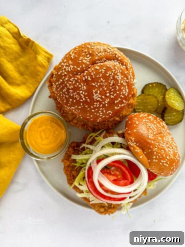 Crispy Pork Tenderloin Sandwich 15 Pinterest graphic for Breaded Pork Tenderloin Sandwich