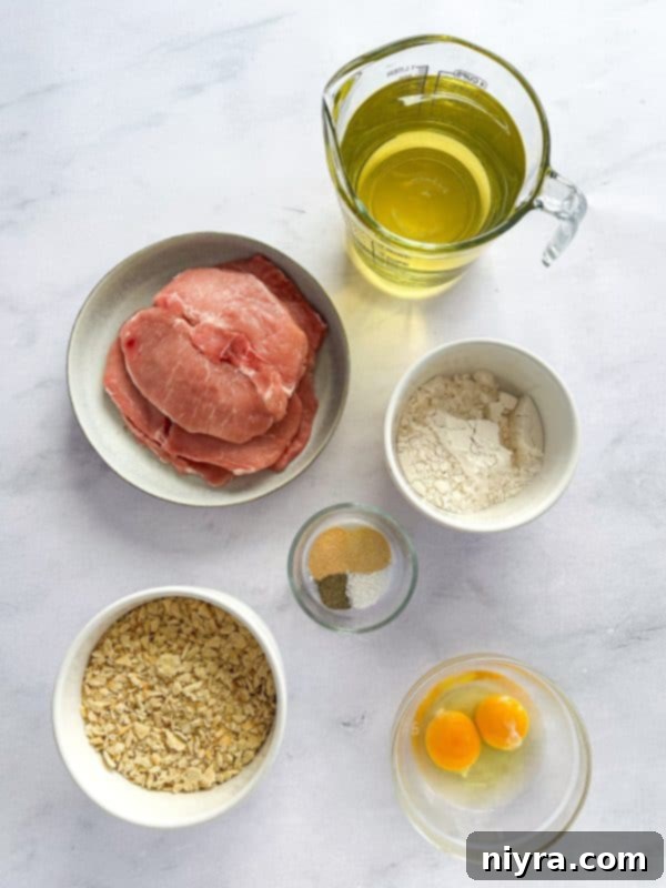 Crispy Pork Tenderloin Sandwich 5 Ingredients for Breaded Pork Tenderloin Sandwich laid out