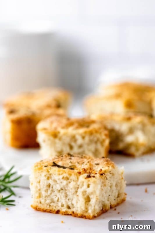 Freshly baked Garlic Rosemary Focaccia Bread with a golden crust and aromatic herbs