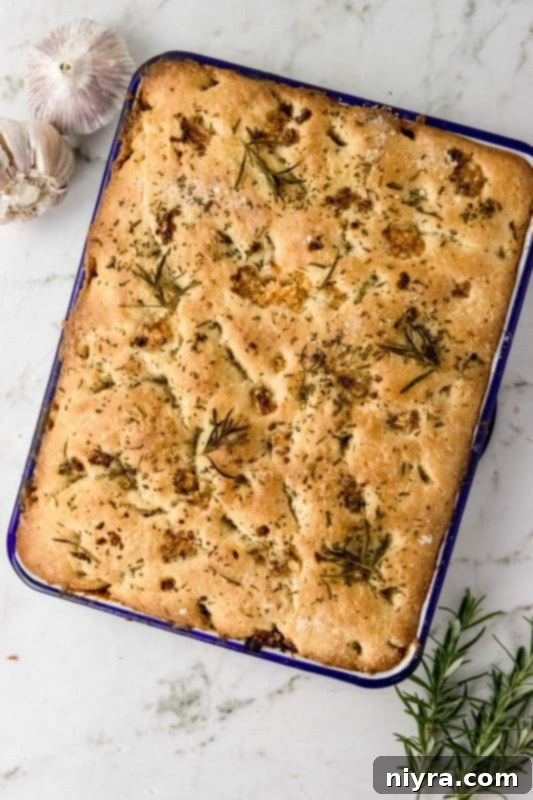 Freshly baked Garlic Rosemary Focaccia Bread, hot out of the oven