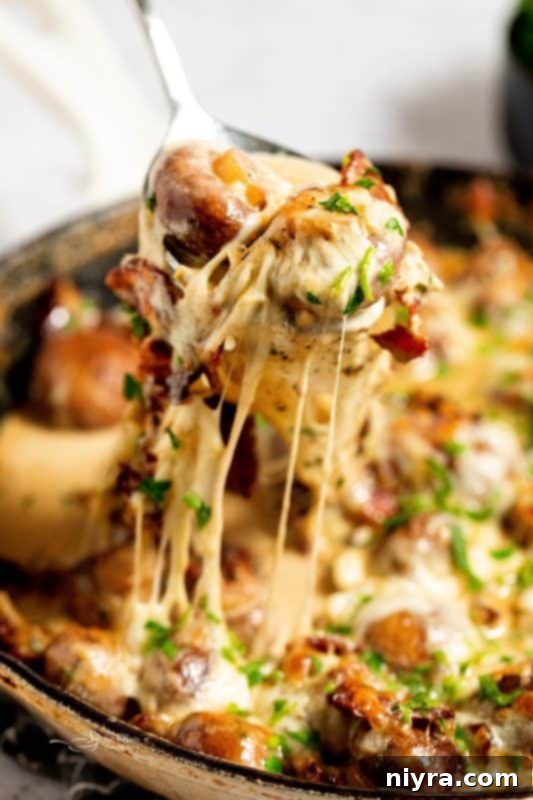 Close-up of Creamy Mushrooms and Bacon, garnished with fresh parsley.