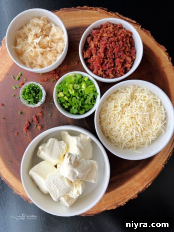 Sauerkraut Bacon & Swiss Cheese Ball garnished with chives and bacon bits