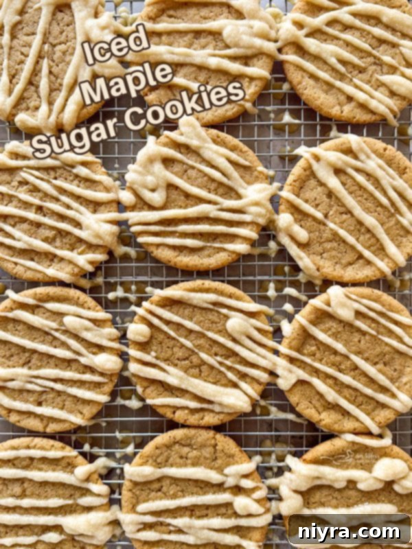 Golden Maple Delights 19 Hero shot of beautifully iced maple sugar cookies, arranged artistically on a light background.