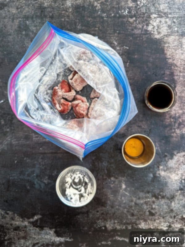 Slicing beef into thin strips.