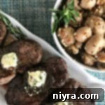 Aromatic Herb Butter Filet Mignon 12 Overhead of Herb Butter Fillets on a white plate and marinated mushrooms in a white bowl