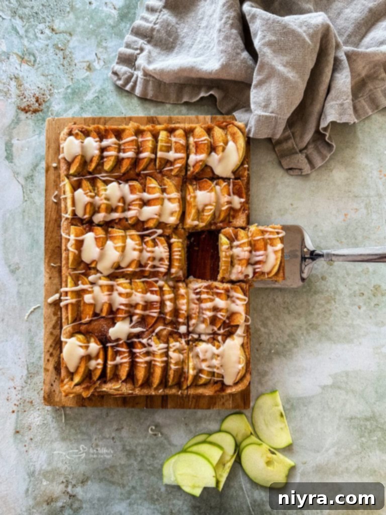 Spiced Rum Caramel Apple Dumplings 18 A square of Apple Kuchen on a serving spatula