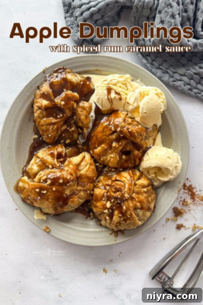 Spiced Rum Caramel Apple Dumplings 19 Close-up of a spiced rum caramel apple dumpling with a spoon
