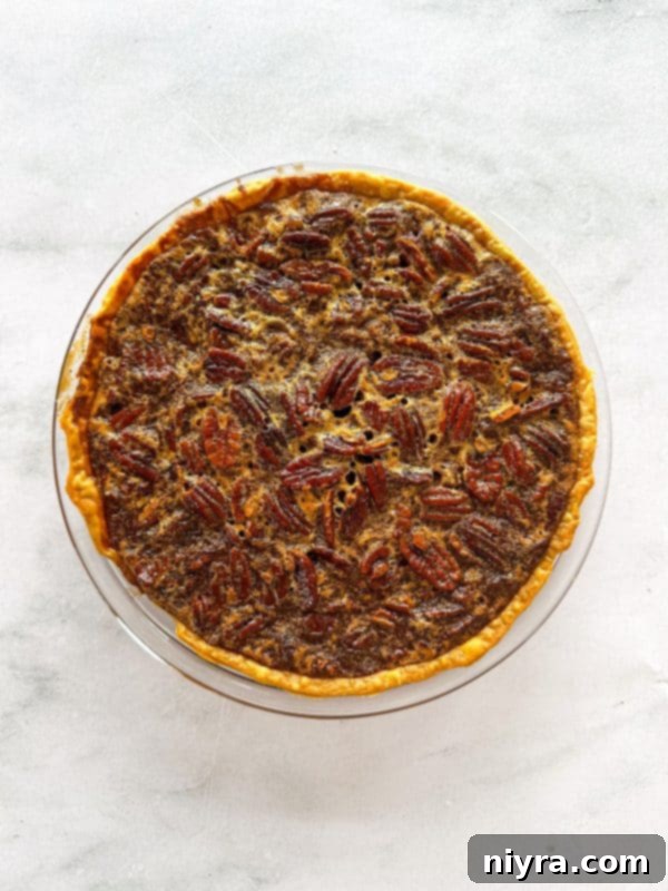 Pecan pie baking in the oven