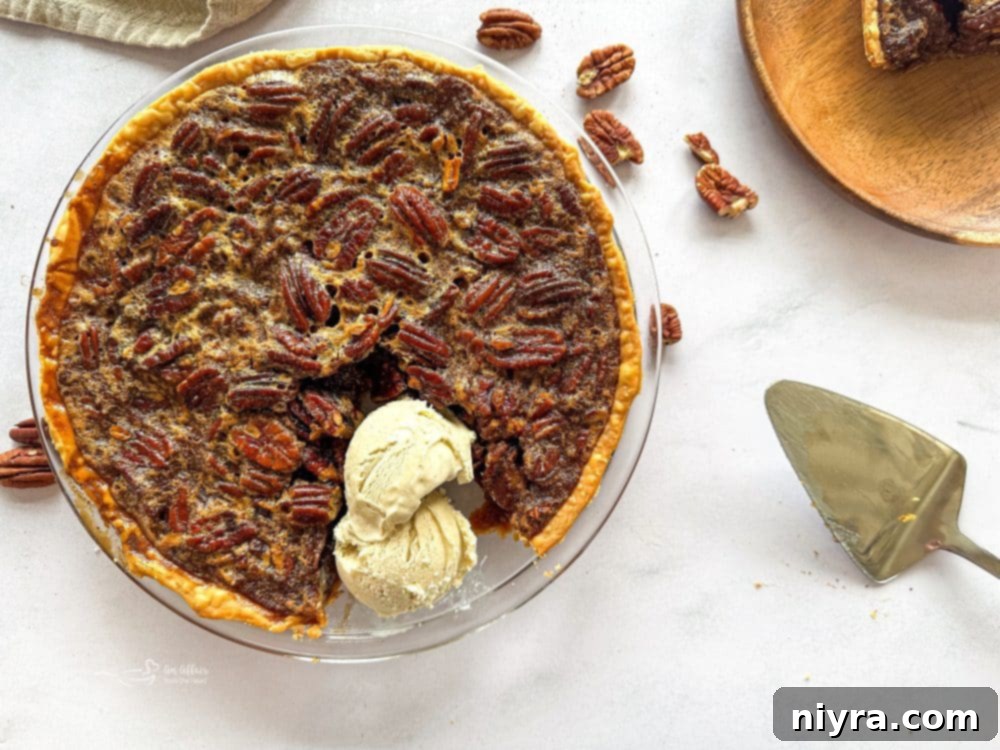 Whole Pecan Pie on a white serving plate