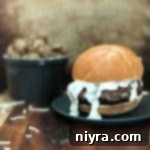 Green Chile Mushroom Burger with Monterey Jack Cheese Sauce on a blue plate