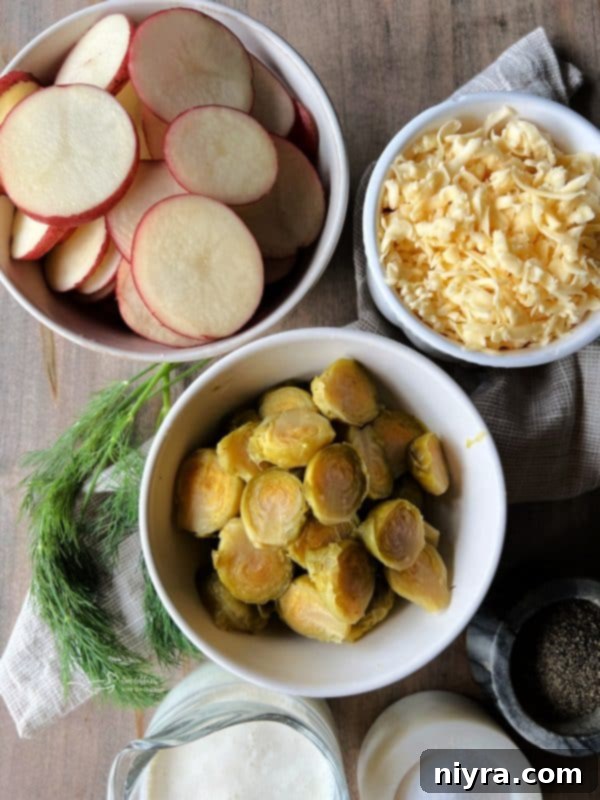 Overhead shot of Brussels Sprouts and Potatoes Au Gratin in a baking dish, ready to be served