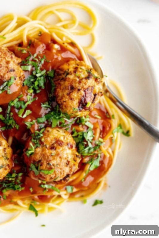 Cooked Air Fryer Turkey Meatballs in a basket