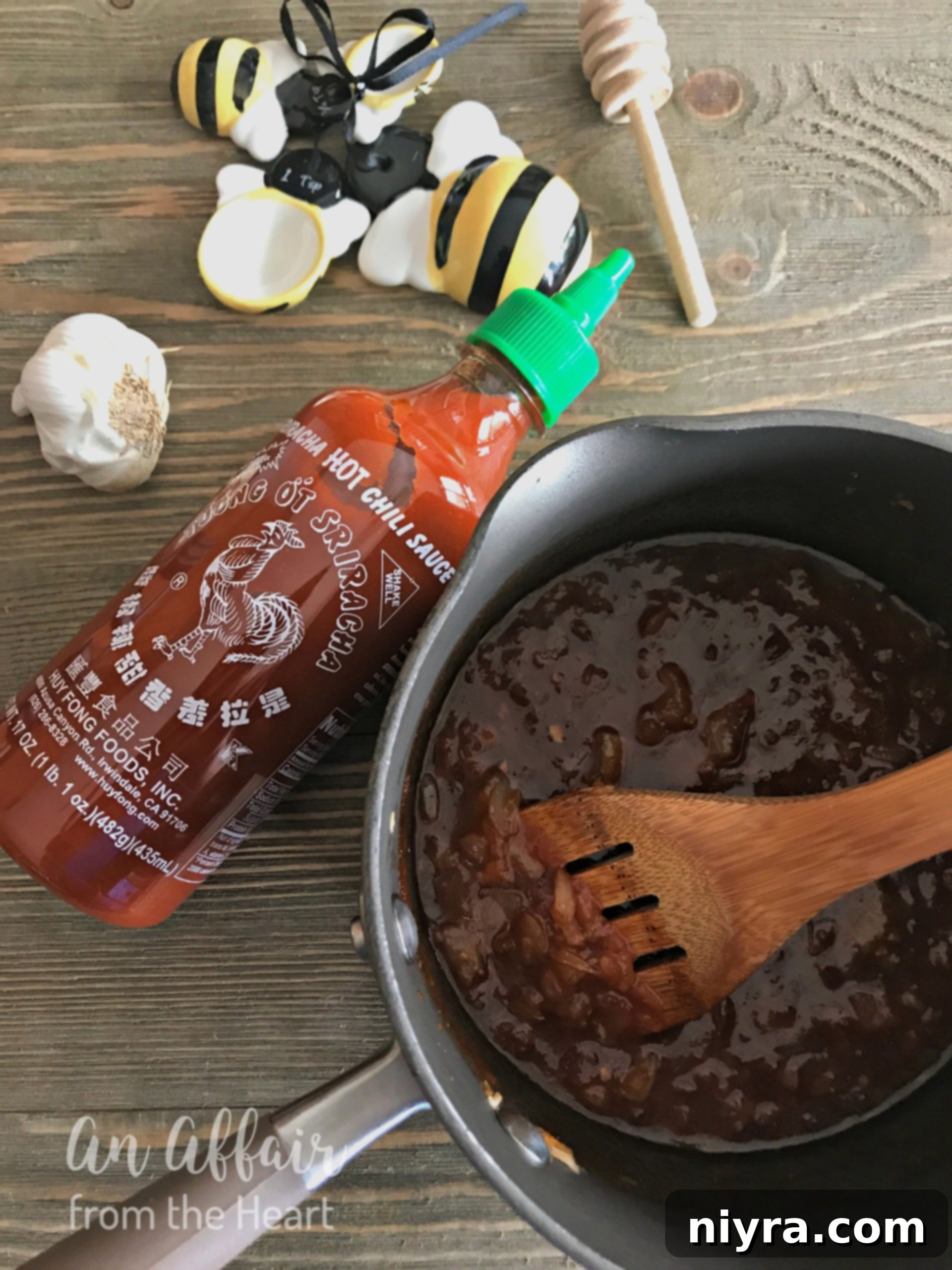Sticky Honey Sriracha Wings 12 Honey Sriracha Wings - making the sauce on the stove