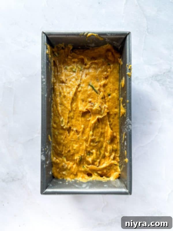 Pumpkin Zucchini Crumble Loaf 11 Mixing wet ingredients for Pumpkin Zucchini Streusel Bread