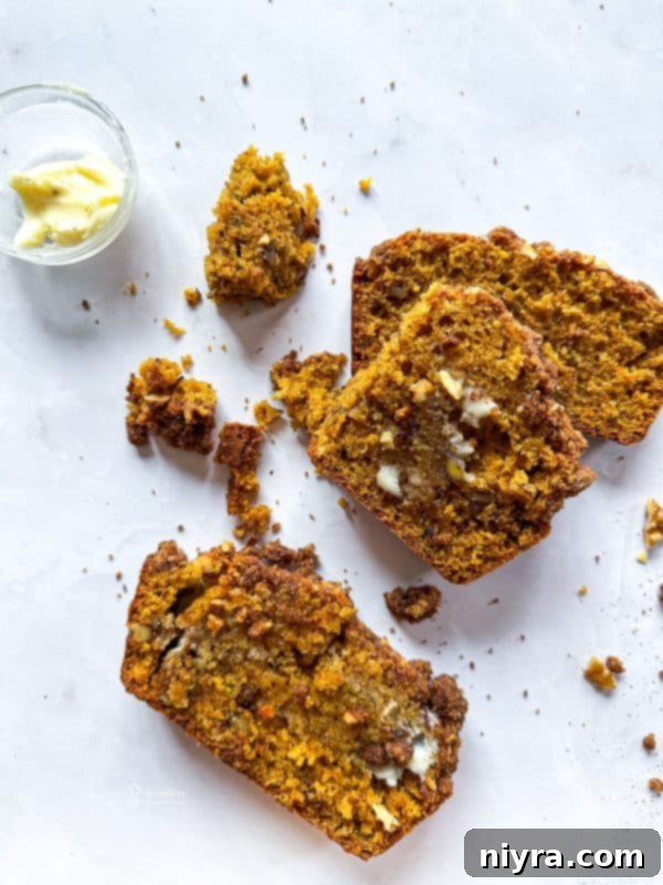 Pumpkin Zucchini Crumble Loaf 3 Two loaves of Pumpkin Zucchini Streusel Bread cooling on a rack