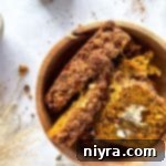 Pumpkin Zucchini Crumble Loaf 22 Pumpkin Zucchini Streusel Bread slices in a brown bowl