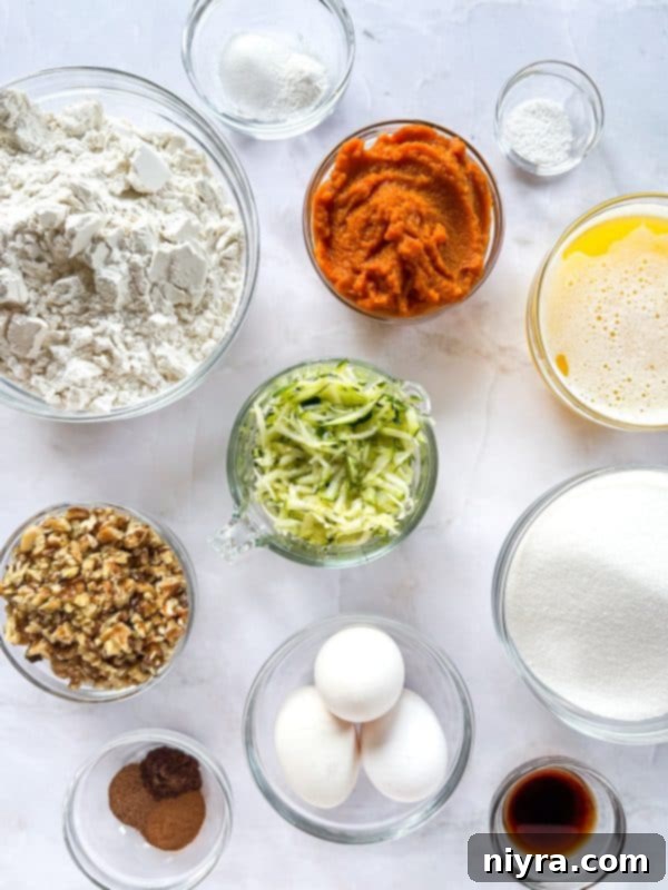 Pumpkin Zucchini Crumble Loaf 6 A loaf of Pumpkin Zucchini Streusel Bread with a knife