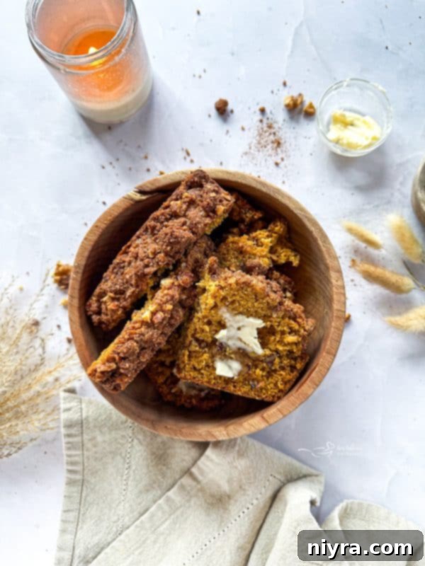 Pumpkin Zucchini Crumble Loaf 8 Unbaked Pumpkin Zucchini Streusel Bread in loaf pans with streusel topping