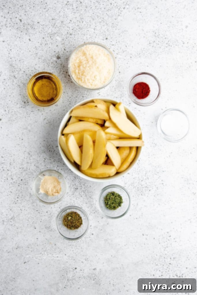 Baked potato wedges with parmesan and herbs ready to serve