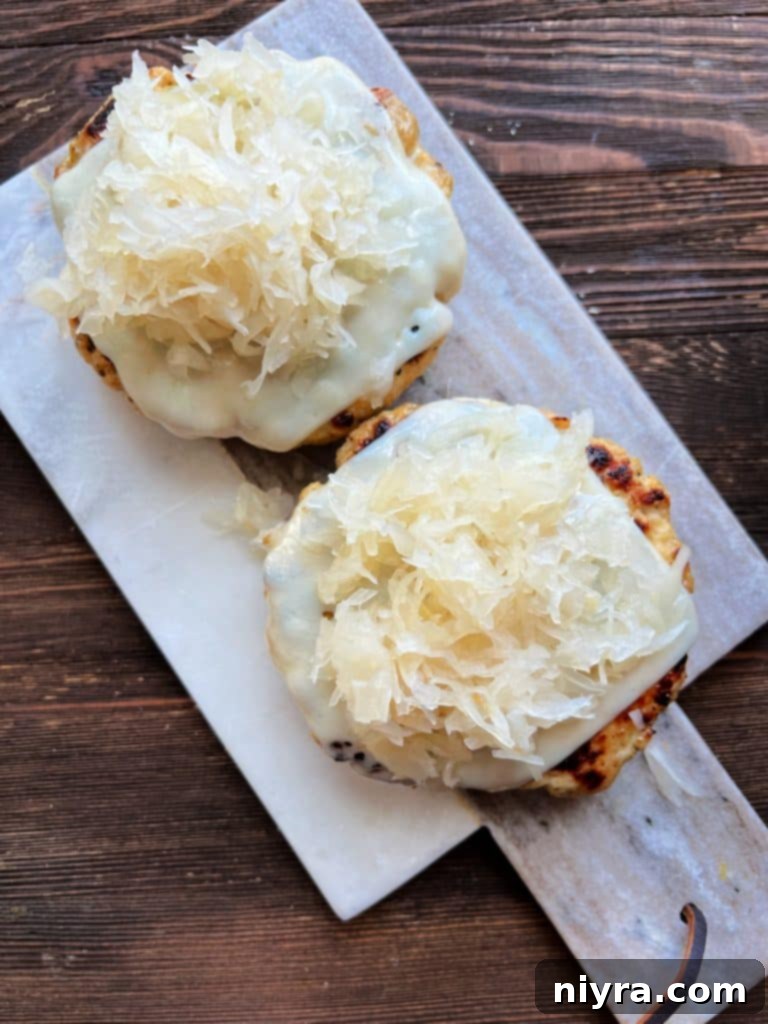 Toasting hamburger buns on the grill.