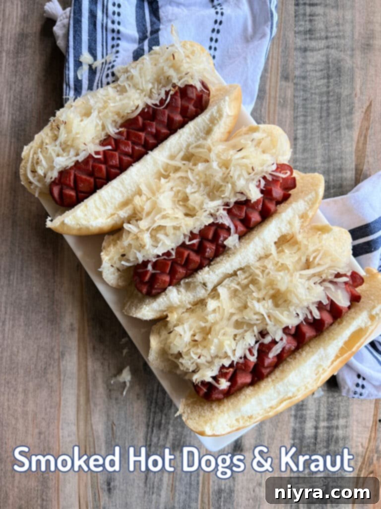 Smoked Hot Dogs & Kraut in buns on a serving plate