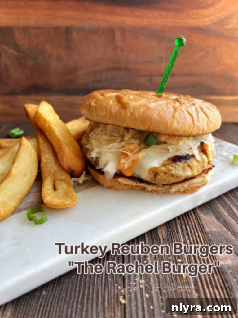 A stunning hero shot of a perfectly plated Turkey Reuben Burger.