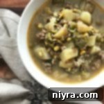 Overhead of Rustic Harvest Stew in a white bowl
