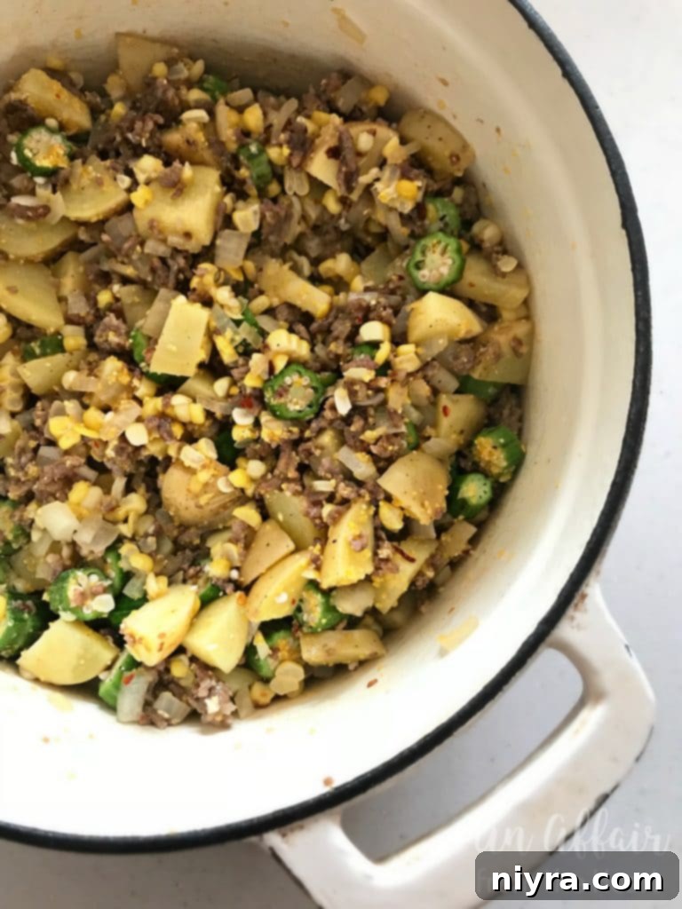 Cooking Rustic Harvest Stew ingredients in a pot