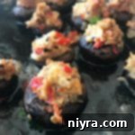 Close up of Seafood Stuffed Mushrooms cooking
