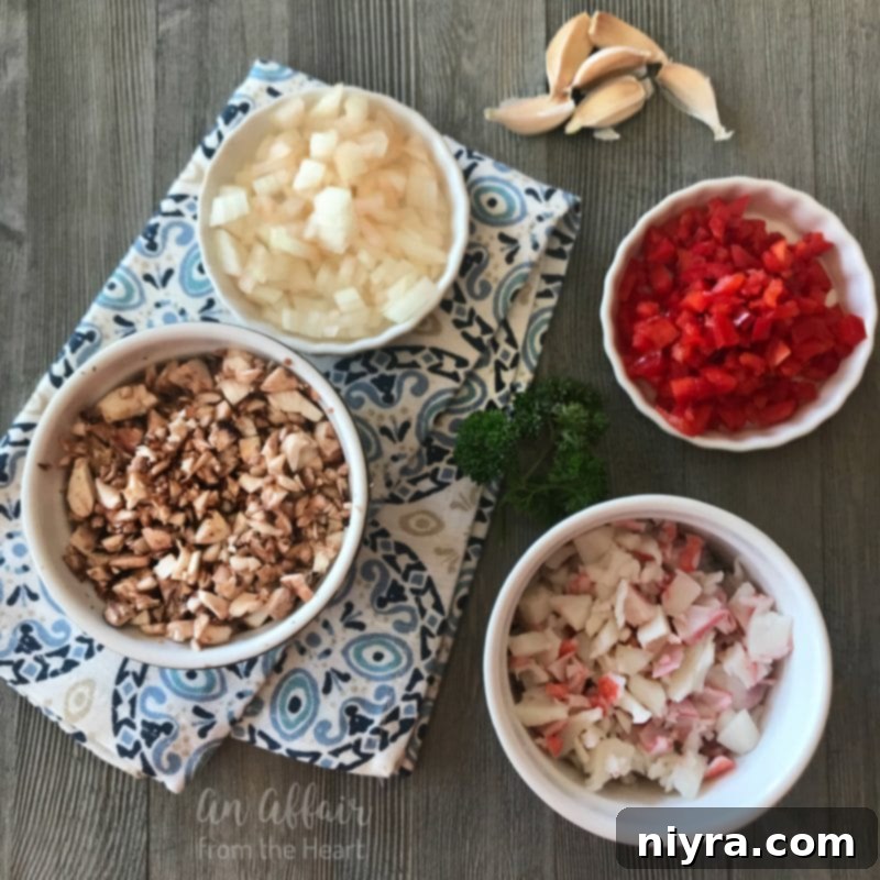 Surimi Seafood, bell pepper, and onion being chopped for stuffing